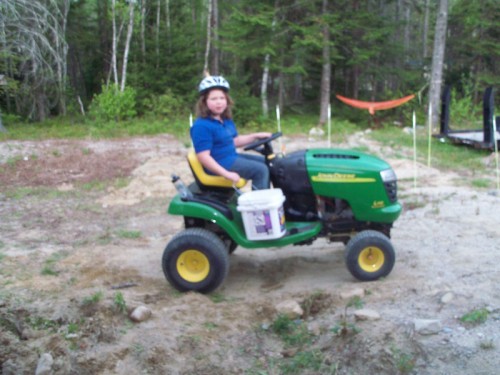 Hannah cruising on her tractor