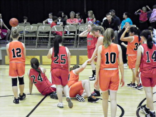 Hannah in a basketball tussel