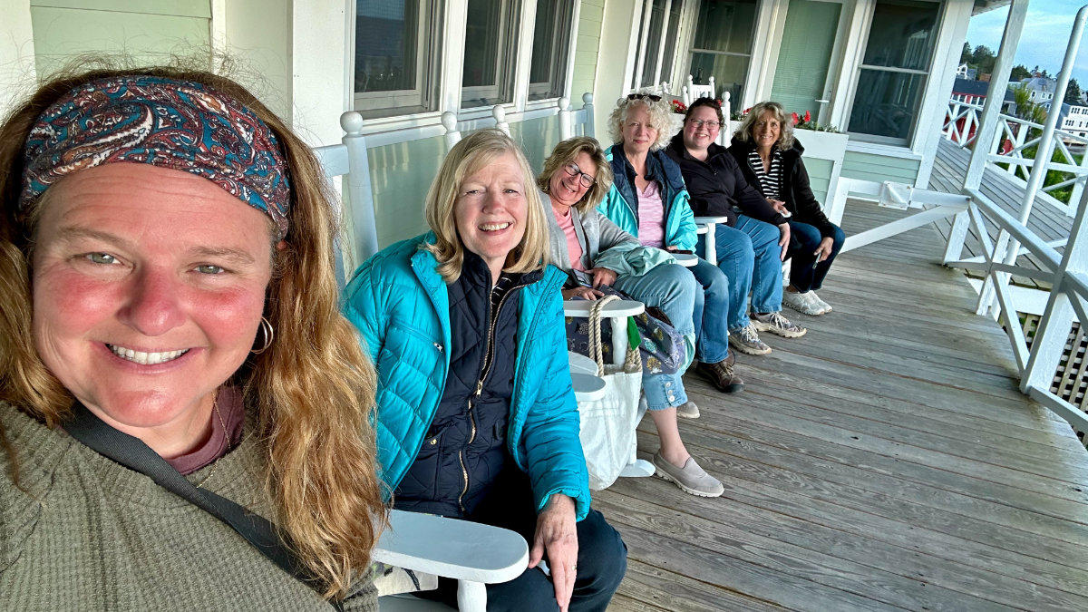 friends on the porch of the Island Inn